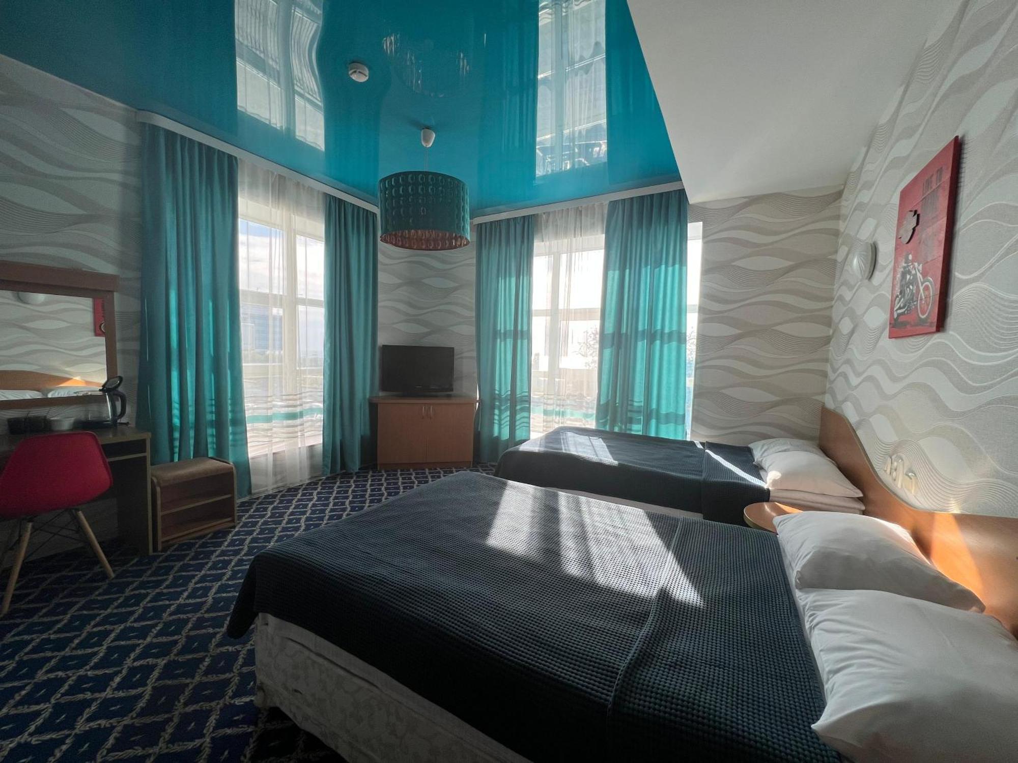 Three Dolphins Hotel Aktau  Bagian luar foto